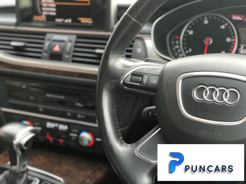 Audi A6 brown and black Interior wedding car rental in punjab chandigarh